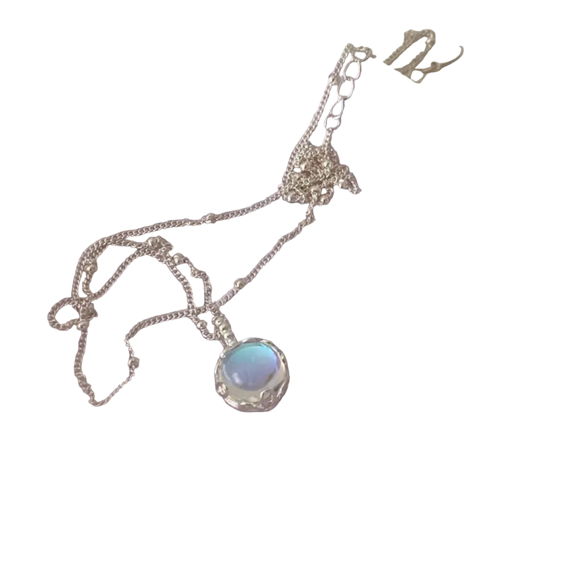Moonstone pendant necklace in 925 sterling silver, alternate flat-lay view on a pure white background