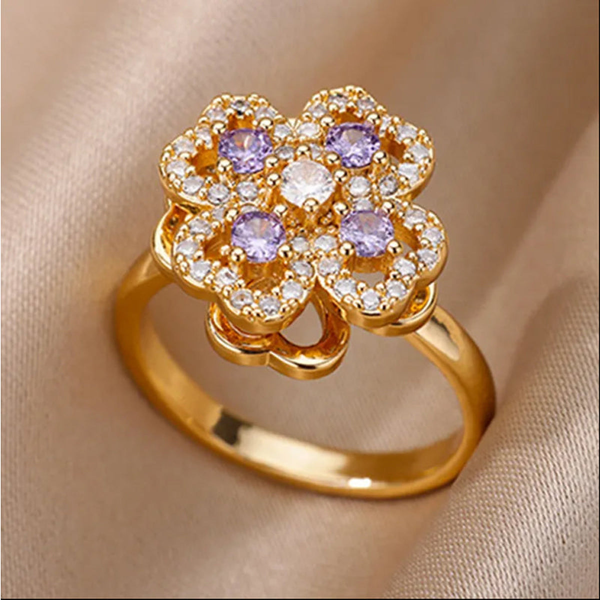 Gold-Tone Rotating Clover Ring with CZ – Open Adjustable Band