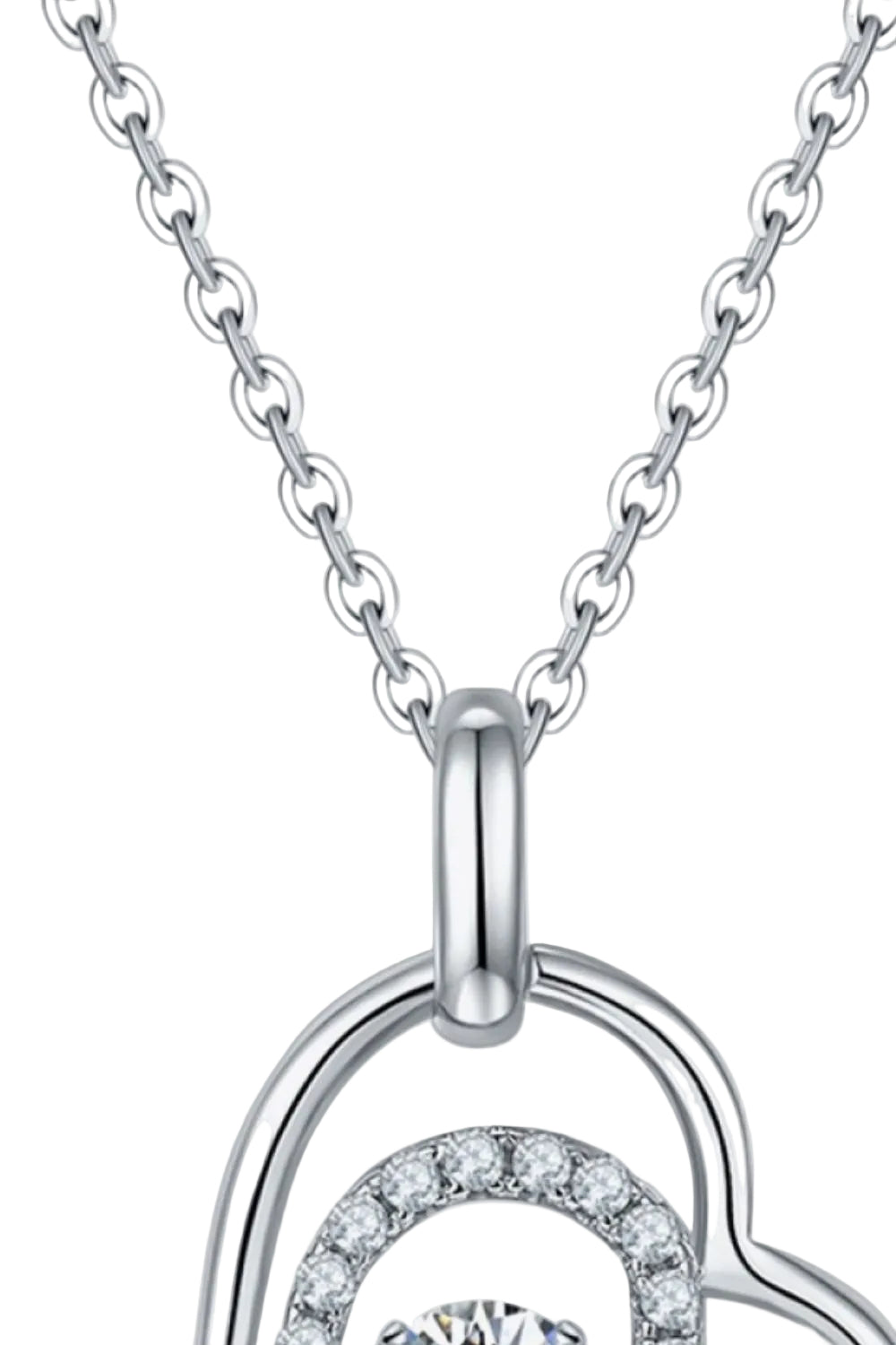0.5 carat moissanite heart pendant necklace, chain and bail close-up on pure white