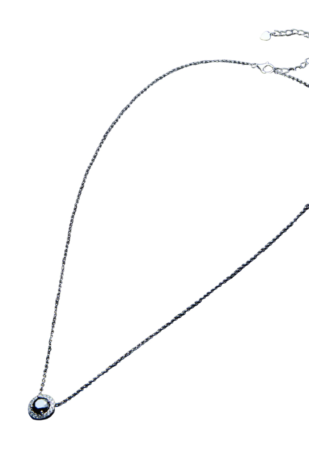 Black moissanite round pendant necklace, full chain angled view on pure white