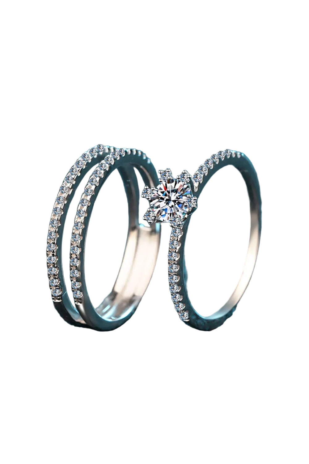 0.5 carat moissanite ring set in rhodium-plated sterling silver, two rings in side profile on pure white