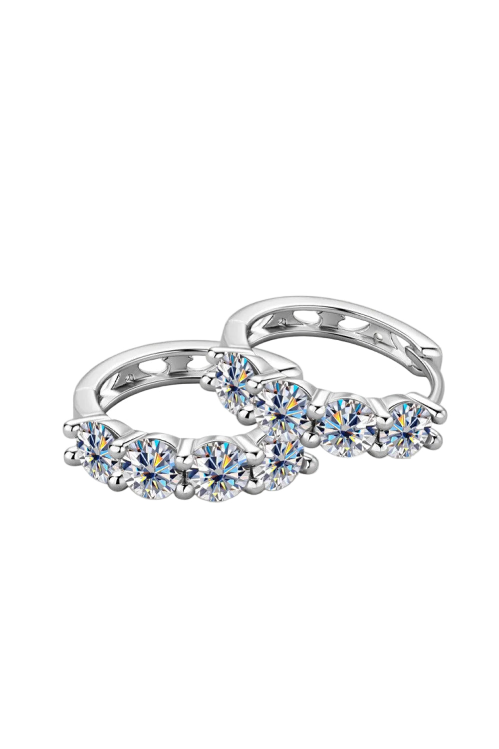2.4 carat moissanite huggie earrings in sterling silver, angled pair on pure white
